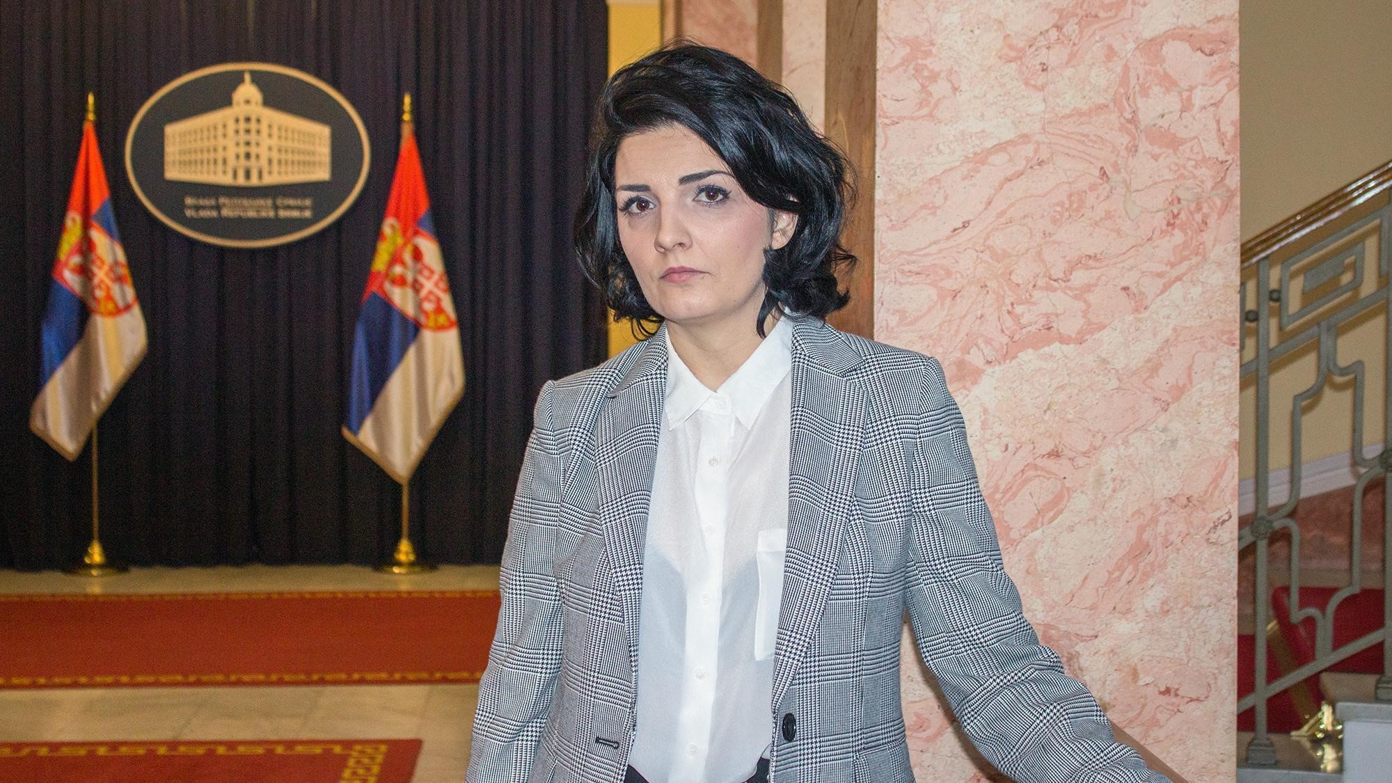 Milena Ivanovic Popovic, wife of the late Oliver Ivanovic, looks into the camera at the headquarters of the Serbian government in Belgrade. Photo: Stefan Milivojevic